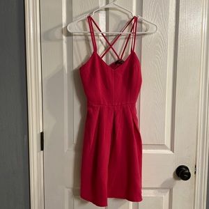 XS hot pink cocktail dress with criss-cross back strap.